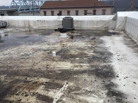 ponding water_hail_damaged_roof