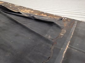 Addressing Wind Damage For Flat Commercial Roofs