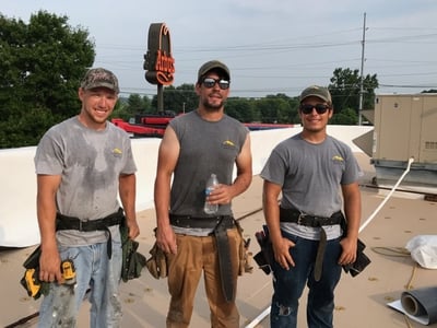 Working Men TPO Flat Roof Repair.jpg